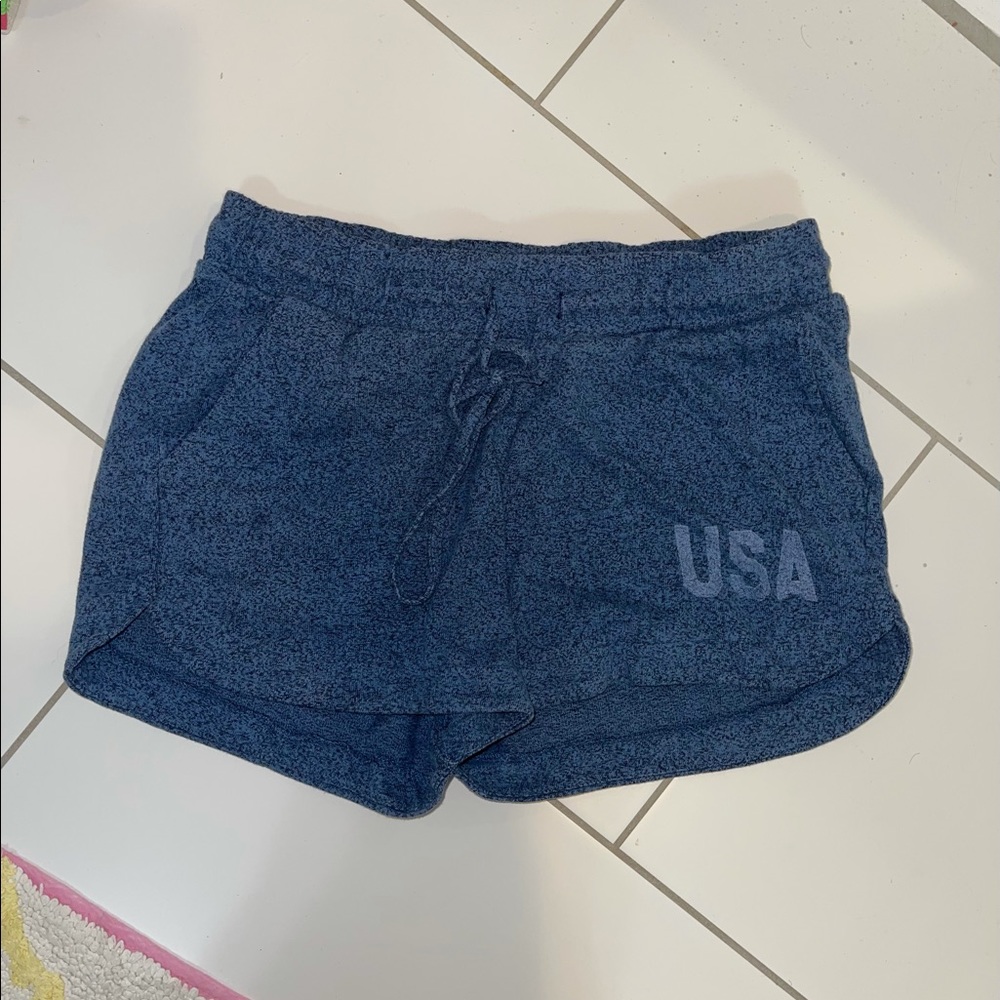 Blue lounge shorts with USA symbol on right leg